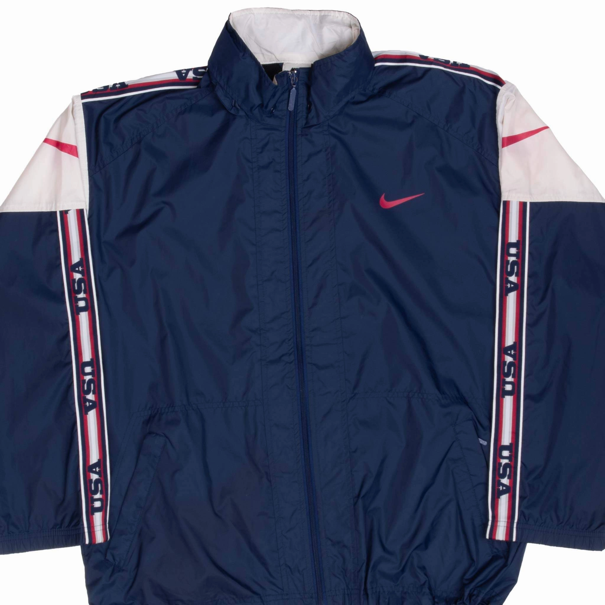 Seamless Edging VINTAGE NIKE TEAM USA CLASSIC SWOOSH BLUE WINDBREAKER JACKET 1990S SIZE MEDIUM